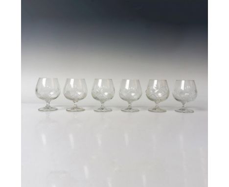 A set of six brandy snifters featuring a diamond-cut pattern seamlessly merged with a leaf-like design, complemented by disti