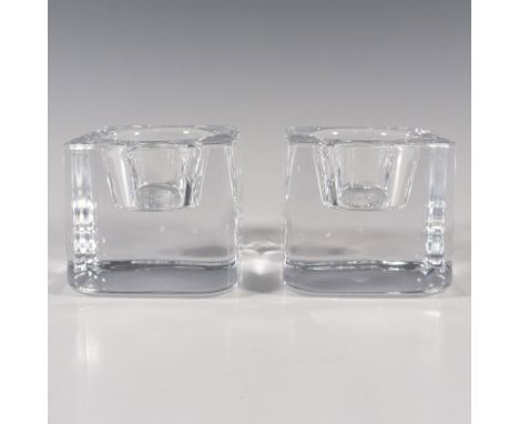 A crystal clear square votive candle holders. Orrefors stickered. This item has its original box: 3"L x 3"W x 3"H. Artist: Go
