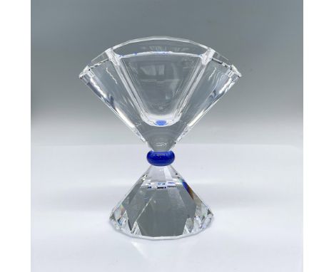 A clear crystal fan form vase with a blue colored stone at the thinnest point. Swarovski Selection engraved on the underside.