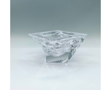 Clear twisted square shape bowl with vertical cuts. Orrefors marked. Issued: 2009-2010Dimensions: 5.5"L x 5.5"W x 3.5"HManufa