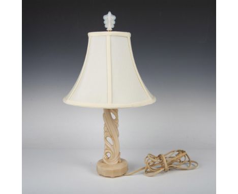 Exquisite Art Deco-inspired scroll design lamp crafted in translucent peach-colored glass with complimentary finial. Issued: 