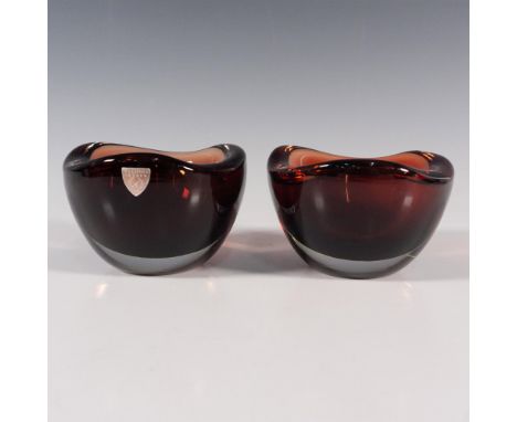 A set of 2 free form clear and red votive candle holders. Orrefors etched signature on the underside. Artist: Sven PalmquistI