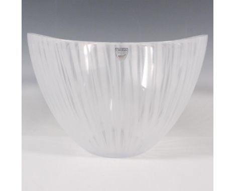 An oval form clear bowl with frosted-white vertical streaks. Orrefors stickered on the side, and engraved on the underside. T