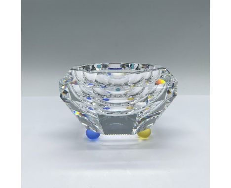 Part of the Swarovski Crystal Home Accessories. Crystal clear octagonal form bowl with three different color round feet; blue