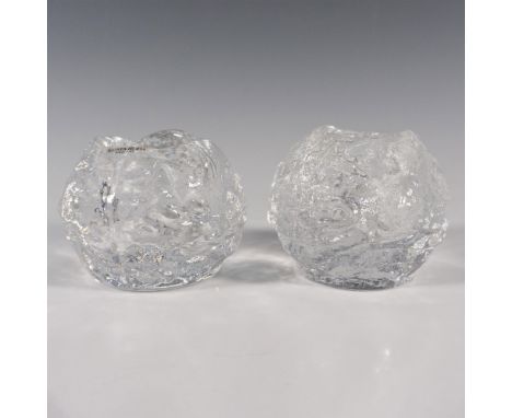 A set of 2 clear texture votive candle holders in a form of a frosted snowball. This item has its original box: 3.75"L x 3.75