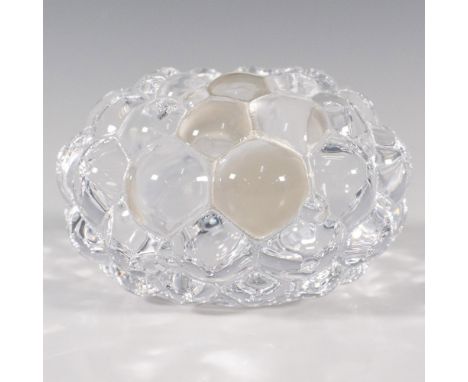 A clear votive candle holder in a round cluster form. Orrefors marked. This item has its original box: 4.5"L x 4.5"W x 3"H. A