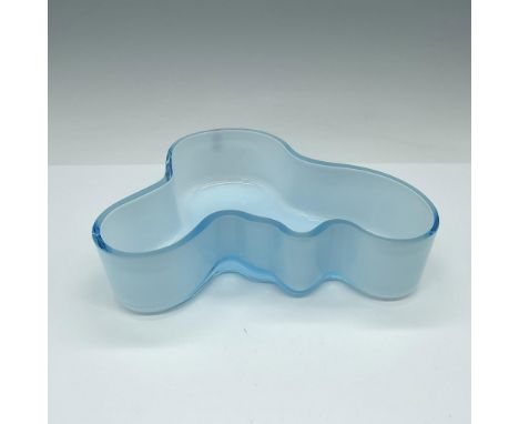 Fluid organic shaped bowl in blue glass with a white finish. This item has its original box: 8"L x 6.25"W x 2.25"H. Iittala b