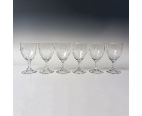 Six water goblets showcasing a diamond-cut pattern seamlessly united with a leaf-like design, complemented by unique hexagona