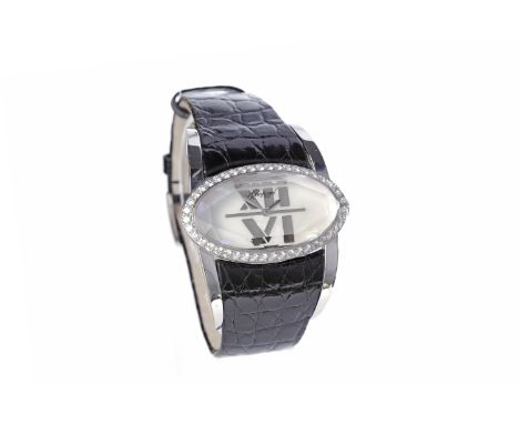 LADY'S CHOPARD EIGHTEEN CARAT WHITE GOLD DIAMOND SET QUARTZ WRIST WATCHthe oval mother of pearl dial with applied 12 and 6 in