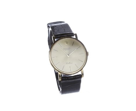 GENTLEMAN'S ROLEX CELLINI EIGHTEEN CARAT GOLD MANUAL WIND WRIST WATCHthe round champagne dial with gold edged baton hour mark