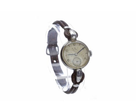 LADY'S ROLEX PRECISION STAINLESS STEEL MANUAL WIND WRIST WATCHc. 1960, the round dial with Arabic numerals and double baton h