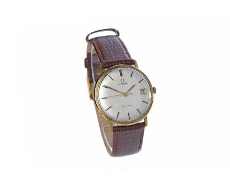 GENTLEMAN'S OMEGA GENEVE GOLD MANUAL WIND WRIST WATCHthe round silver coloured dial with applied gold coloured baton hour mar