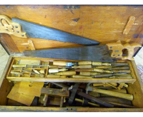 An Early Painted Pine Toolbox, containing a collection of early hand tools to include moulding planes, chisels, saws and othe
