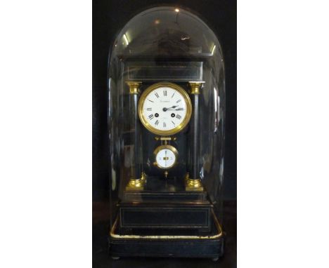 A 19th Century French Ebonised and Brass Portico Clock, the enamel dial with Roman numerals and two train striking movement, 