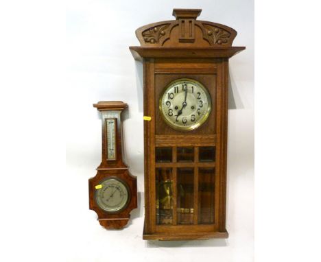 An Art Deco Burr Walnut Barometer Thermometer, together with a 1930's oak wall clock