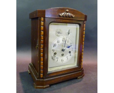 An Edwardian Mahogany Cased Mantel Clock, the movement inscribed Wurttemberg A32 with strike silent and slow fast dials and t