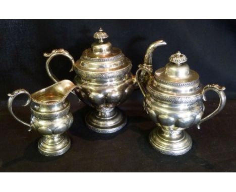 A Continental White Metal Three Piece Tea Service, comprising teapot, covered sucrier and jug, 51 ozs