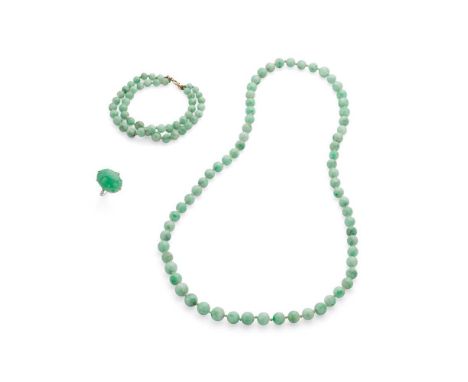 A jadeite jade bead necklace, bracelet and ring the necklace composed of a single row of jadeite jade beads, the bracelet com