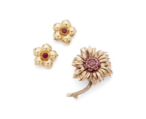 A ruby brooch and earrings the brooch modelled as a flower, claw-set with eight circular-cut rubies, stamped 9ct; together wi