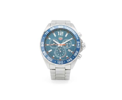 TAG Heuer: a chronograph wrist watch Formula 1 model CAZ1014, stainless steel case, quartz movement, round blue dial with lum