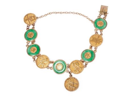 A Chinese jadeite jade bracelet composed of alternating jadeite jadecirclets with Chinese character centres and disc links wi