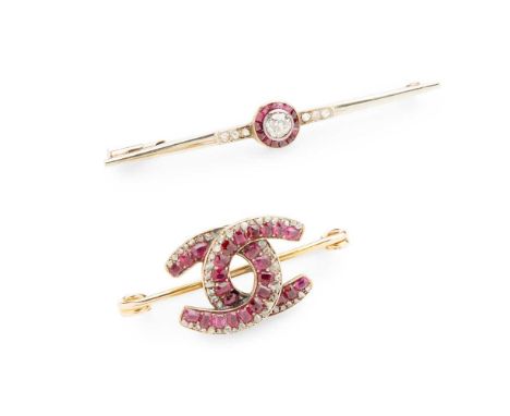 Two ruby and diamond brooches the first of double-C motif set with cushion-shaped rubies and rose-cut diamonds, unmarked; the