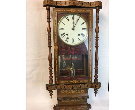 A Tunbridge Ware decorated wall clock, possibly American, rectangular with turned pillar to either side, over scroll base, mi