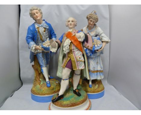 Three Paris biscuit porcelain figures, of large size, comprising a Gallant and companion, predominantly of sky blue colourati