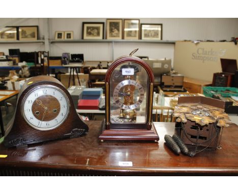 A cuckoo clock, an oak cased two hole mantel clock and one other clock