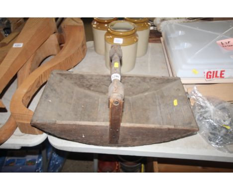 A wooden garden trug