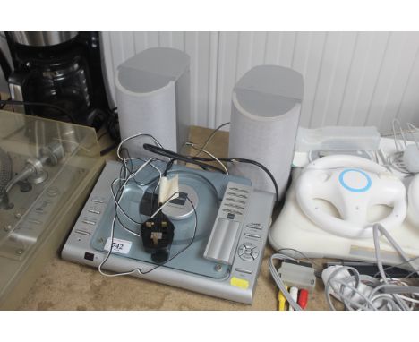 A Bush CD player with remote control and pair of speakers