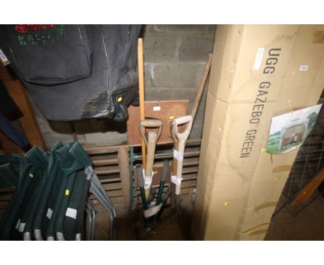 A quantity of gardening tools to include digging fork, garden shears and a small set of folding steps