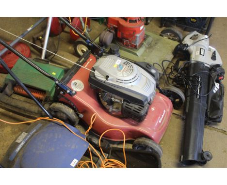 An Einhell GC-PM46 rotary garden lawnmower 