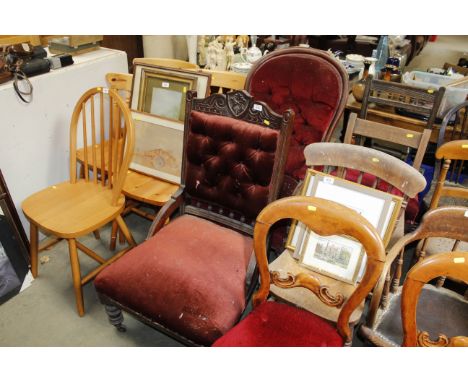 A late Victorian button back upholstered nursing chair and a Victorian button back upholstered armchair 