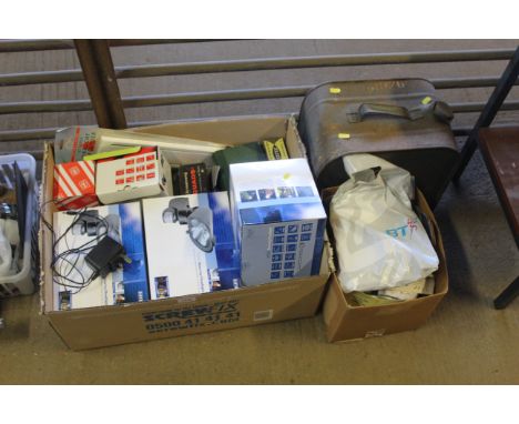 A Cuprinol can and two boxes containing various fittings, outside light fittings etc