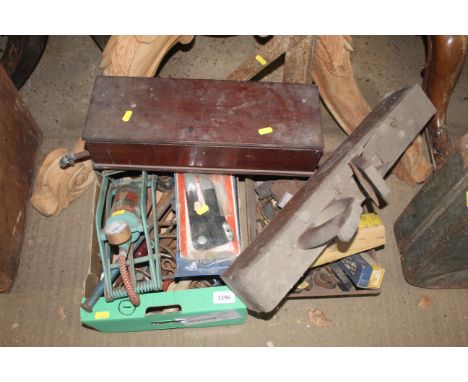 A quantity of various tools to include a wooden smoothing plane, two metal right angles, a wooden tool box with contents of v