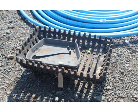 A cast iron fire grate etc.