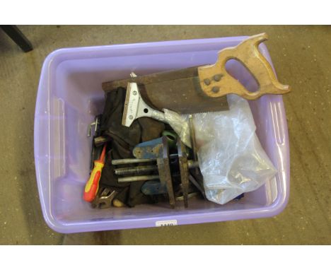 A box of various hand tools and bench vice etc