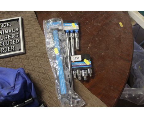 A Silverline crows foot spanner set, a Silverline extension bar set and a four piece chrome Vanadium adapter set 
