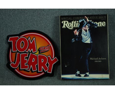 Two modern decorative metal signs. Tom and Jerry and a Michael Jackson Rolling Stone magazine cover. H.83 W.60cm. (largest) 