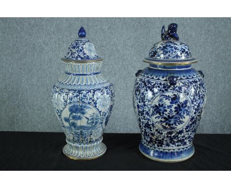 A pair of lidded Chinese pots. Signed with the maker's seal on the base. Probably early twentieth century. H.55cm. (largest) 