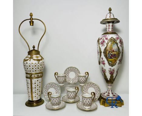 Porcelain: Sèvres: Lot consisting a vase, a lamp and part of a tea set in multi-coloured decorated Sèvres Porcelain, bronze f