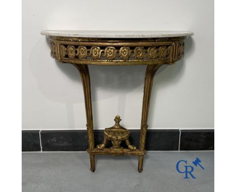 Furniture: Wood sculpted and gilded crescent shaped console. LXVI-period. Height: 80 cm.Width: 83 cm.