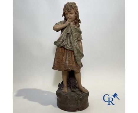 A terra cotta sculpture in the manner of Goldscheider. Height: 66 cm.