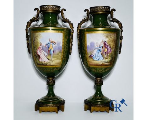 Sèvres: Pair of vases in Sevres porcelain and bronze with a decor of romantic scenes on a green background. Sevres mark. peri