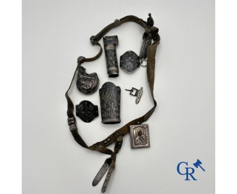 Jewellery/silver: Russian work: Lot consisting of a Caucasian belt in silver. Gross weight: 335gr. (severely damaged) and a p
