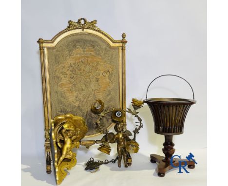 A lot consisting of a bronze chandelier and a corner console with putti, a mahogany wine cooler and an LVI-style fireplace sc