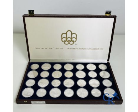 Sterling silver: 28 silver (925°/00) Canadian Olympiad dollars 1976 in original box. Total weight of silver: approx. 1025 gr.