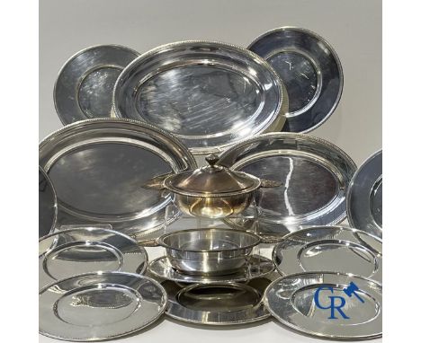 Christofle France, collection Gallia model pearl. Silver-plated metal. 12 round plates. Diam. 30 cm., 1 large oval plate. 40 