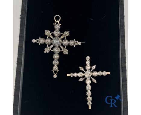Jewellery: Lot of 2 so-called Flemish crosses in silver and diamond. Pendant-Brooch: 5.8 x 4.4 cm. Weight: 9.5 gr.Brooch: 4.6